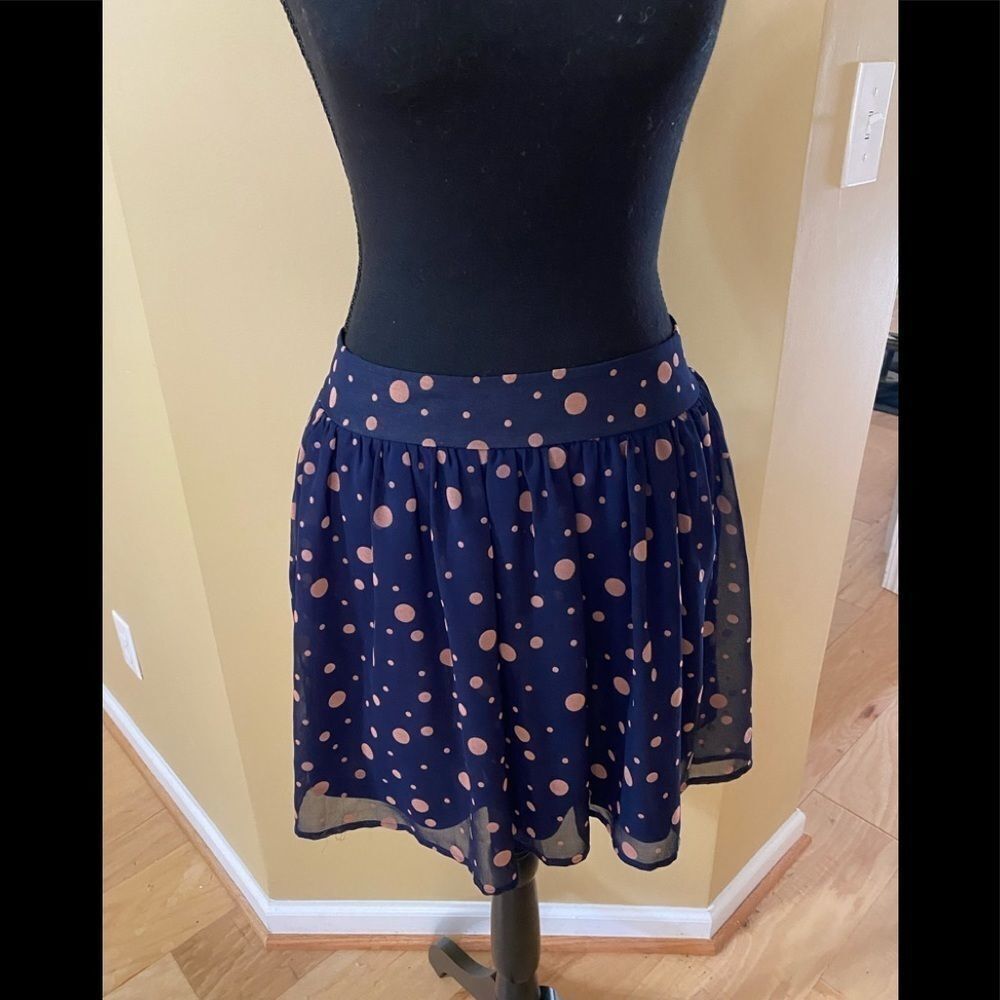 Francesca’s skirt. Size S.Polka dot skirt in navy and pink! Excellent co…